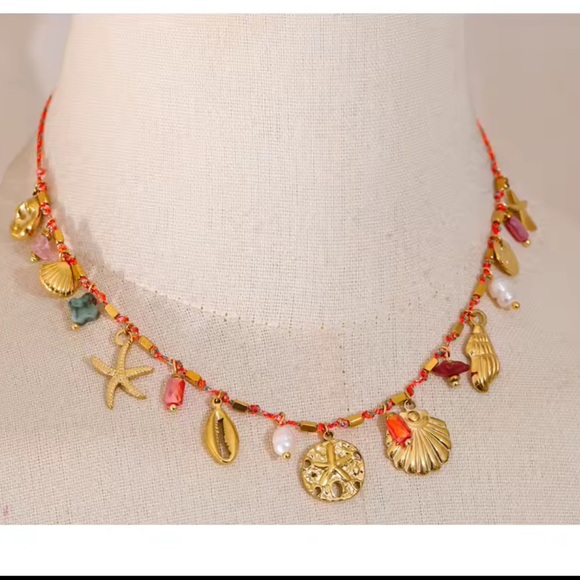 Anthropologie Jewelry - Gold Charm Necklace – Natural Pearls, Crystals, and Shells